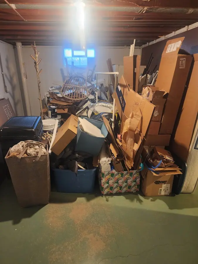 Roll-off dumpster container at job site for Construction Dumpster Rental in Westfield